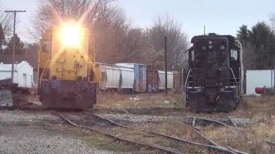 Maumee & Western MAW 4 diesel locomotive wobbles through the yard
