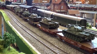 Army train with tanks